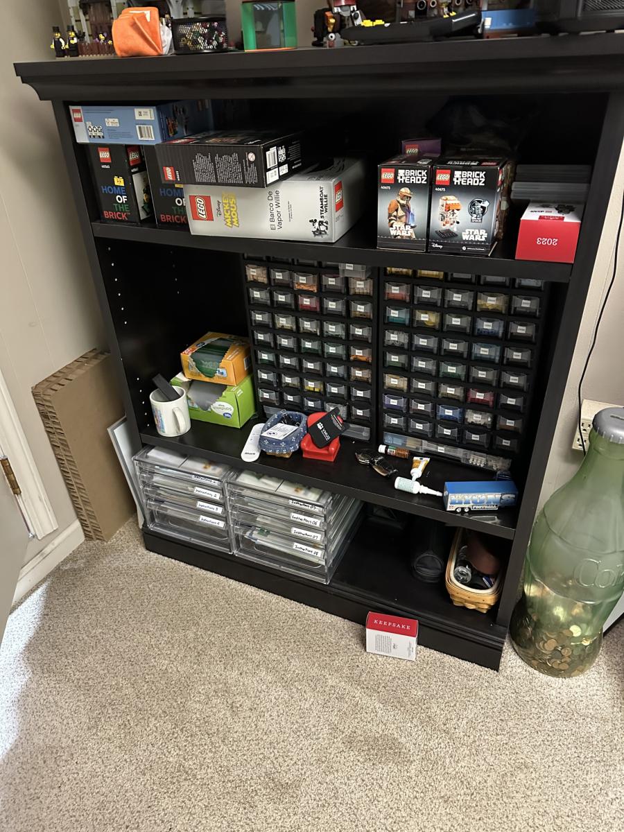 128,00 parts & 11K lots used and new.  Includes sets, minifigs, packing material, storage, and some bulk of parts and Minifig parts.  